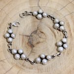 Pulsera Perlas Escudo Adaptable