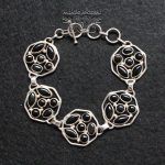 Pulsera Ónix Escudos