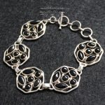 Pulsera Ónix Escudos